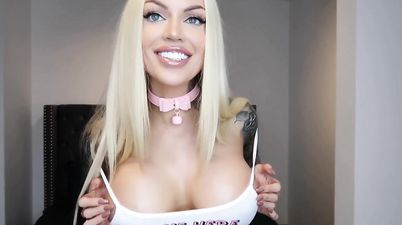 Amateur tattooed blonde with huge silicone tits on webcam